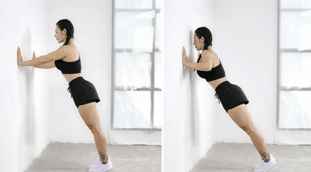 Bài tập ngực cho nữ hiệu quả với động tác chống đẩy với tường 